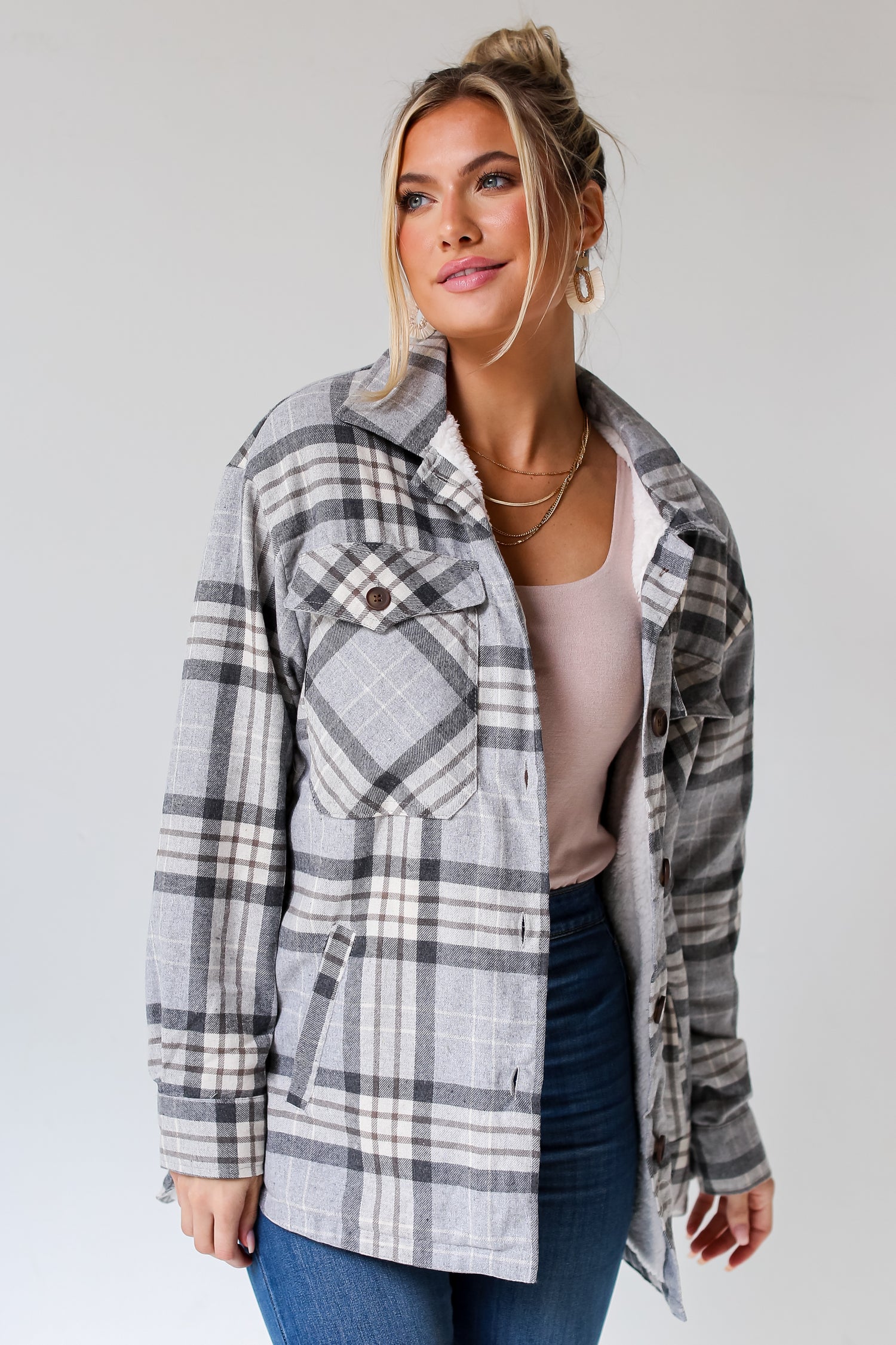 model wearing a  Grey Plaid Sherpa Shacket