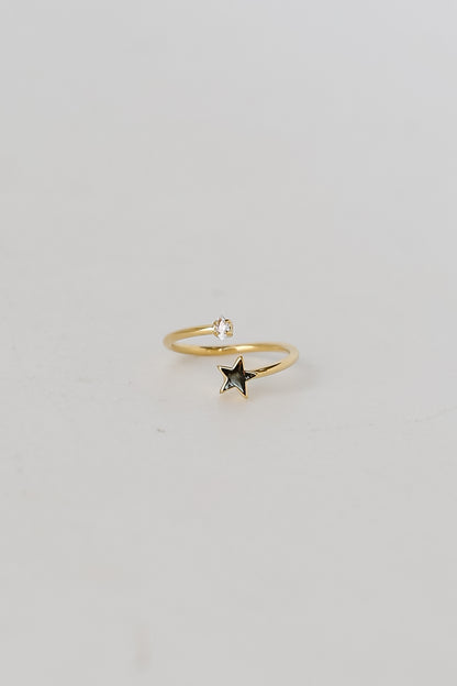 green Rhinestone Star Ring flat lay