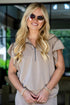 Woman wearing sunglasses and a Ultra Air Soft Taupe Half Zip Top