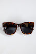 Tortoiseshell sunglasses on a white background
