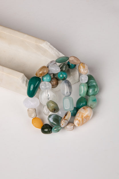 Multicolored beaded bracelet on a white surface