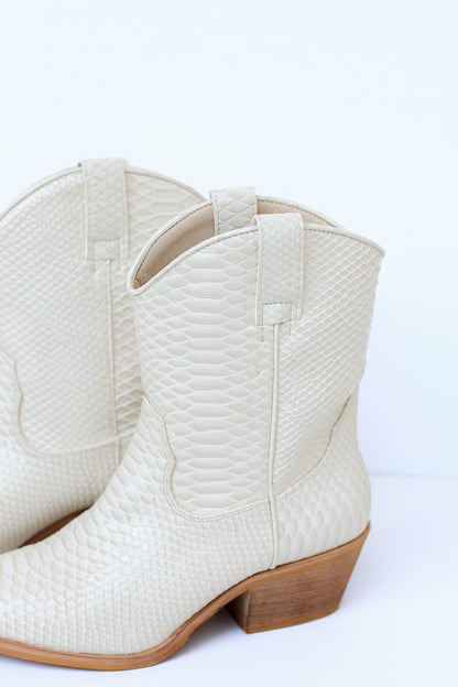 ivory snakeskin Western Booties close up