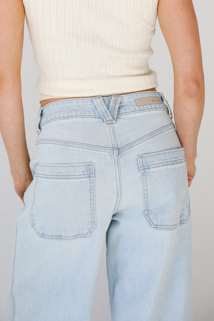 light wash baggy skater jeans back view close up