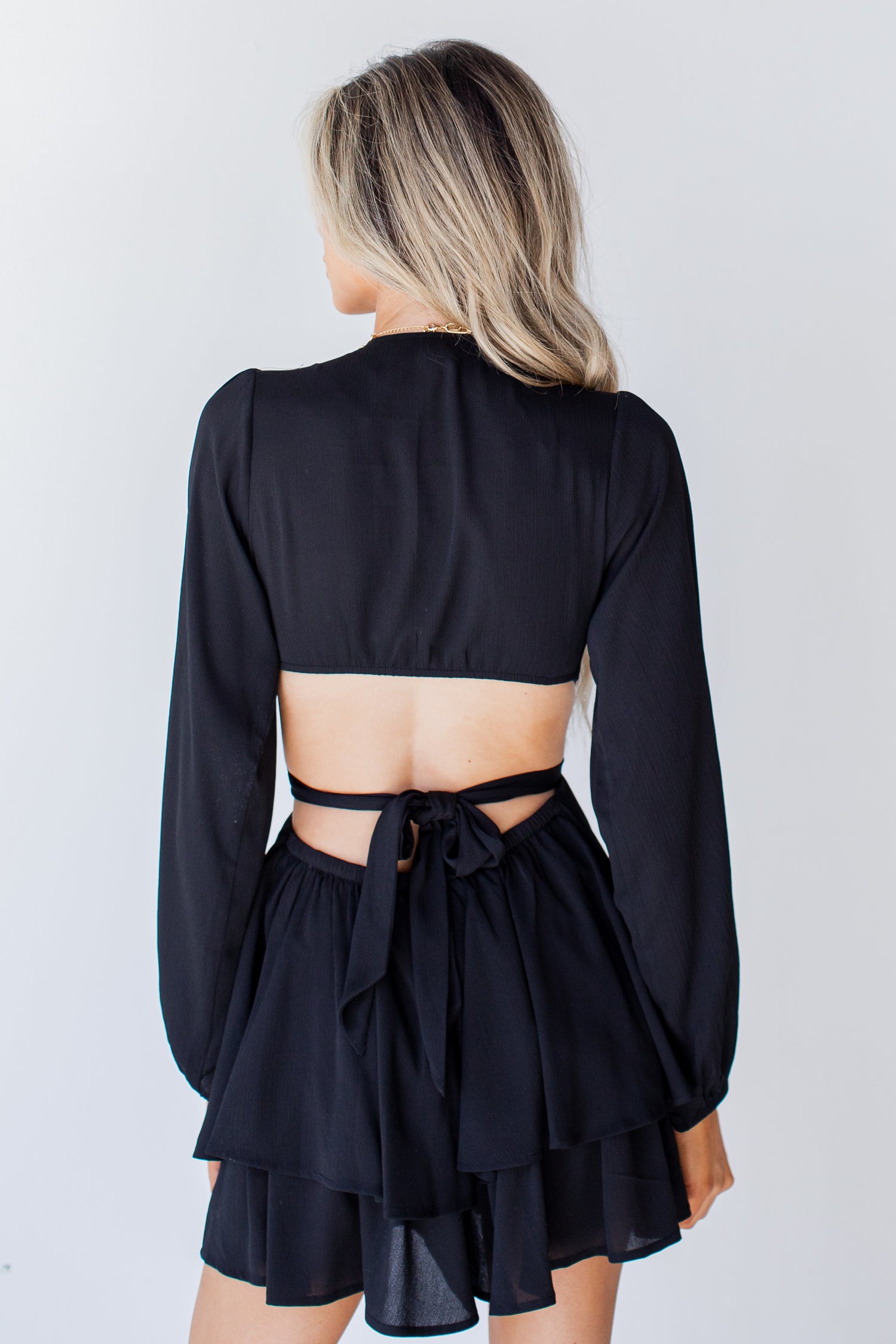 Ruffled Cutout Romper in black back view