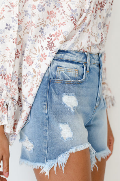 model wearing Distressed Denim Shorts