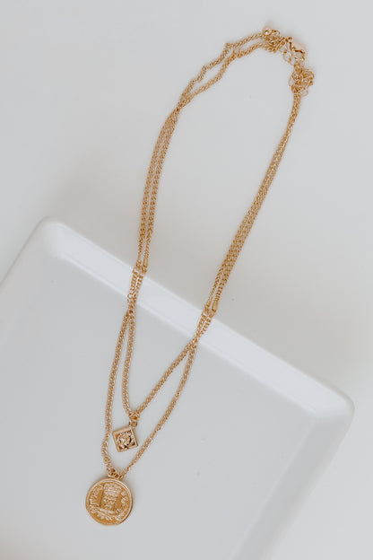 Gold Layered Coin Necklace flat lay