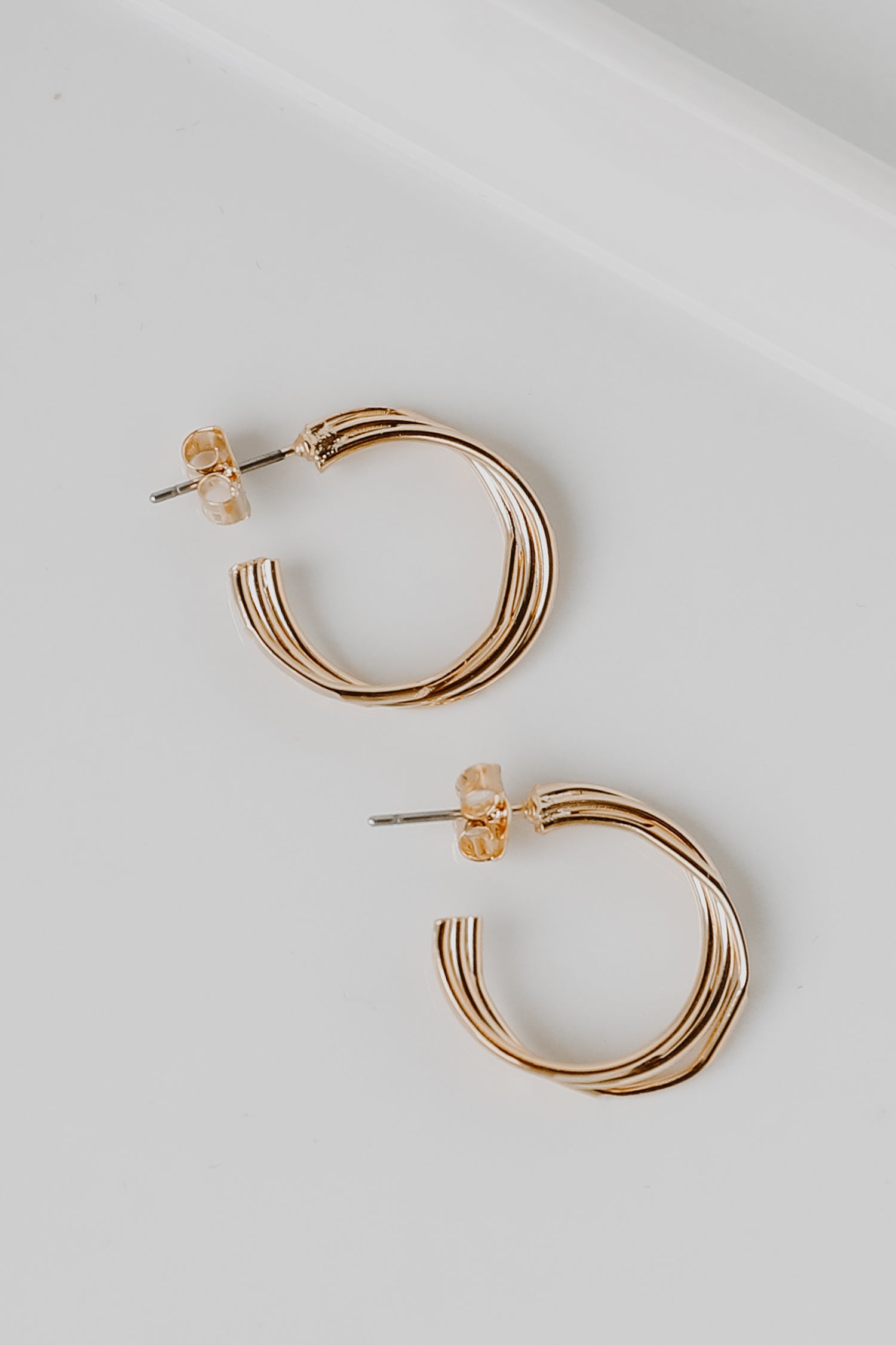 Gold Twisted Hoop Earrings from dress up