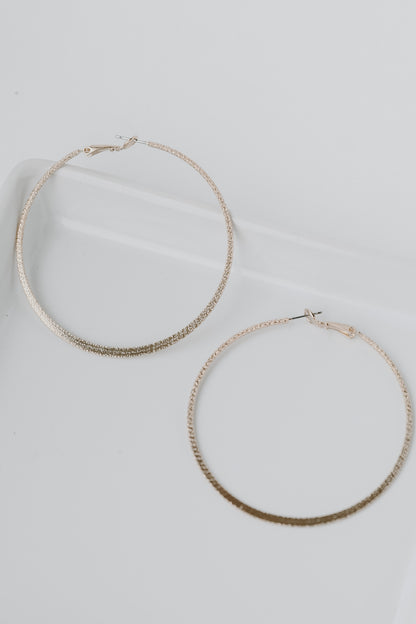 Gold Textured Hoop Earrings flat lay