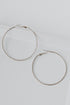 Hammered Hoop Earrings in gold flat lay