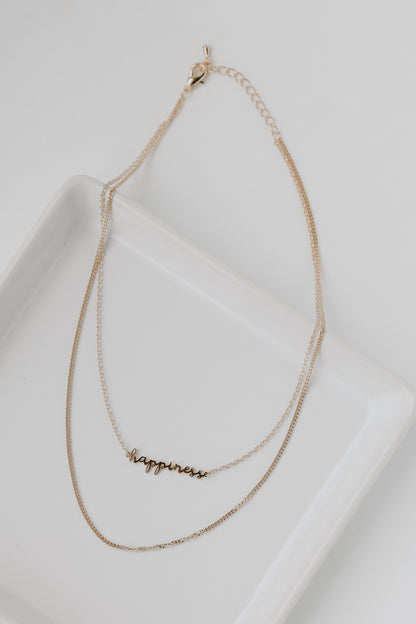 Happiness Gold Layered Necklace flat lay
