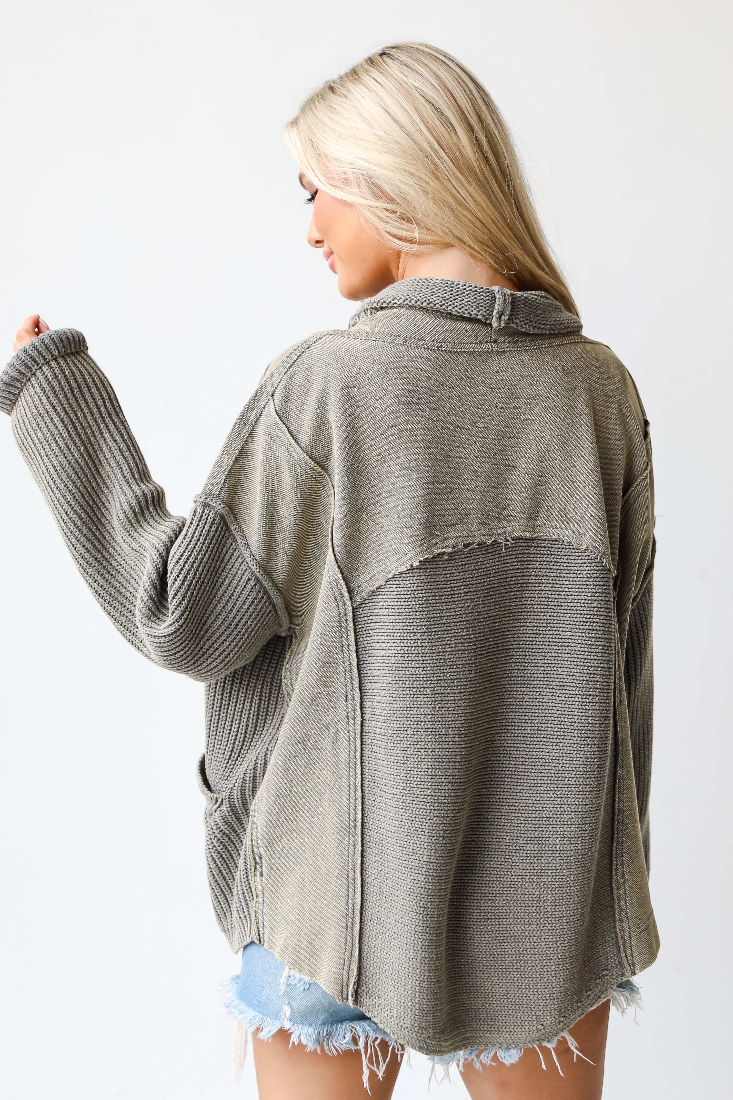 green sweater Cardigan back view