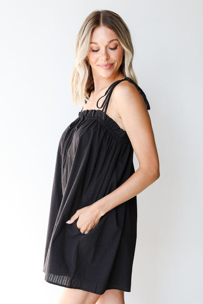 Romper in black side view