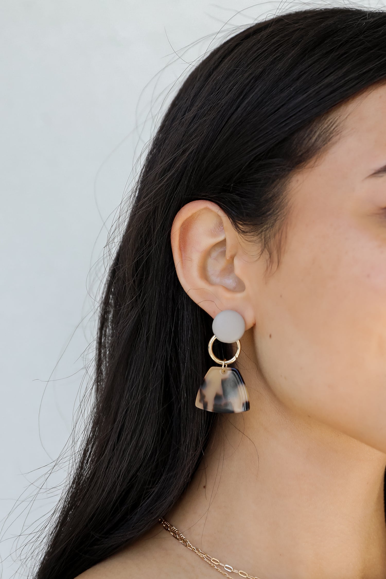 Drop Earrings in grey on model
